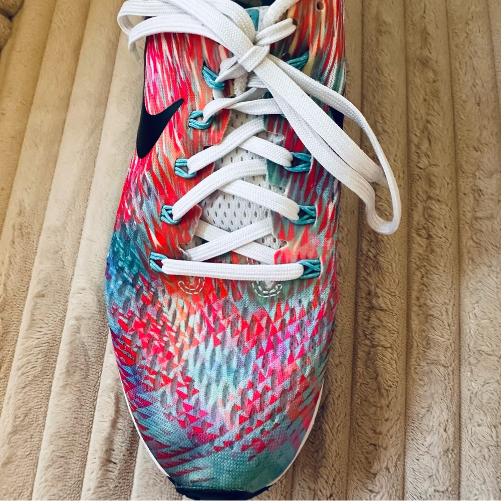 Nike Air Zoom Pegasus 34 in vibrant Sunburst Blue/White-Pink colorway - Picture 7 of 12